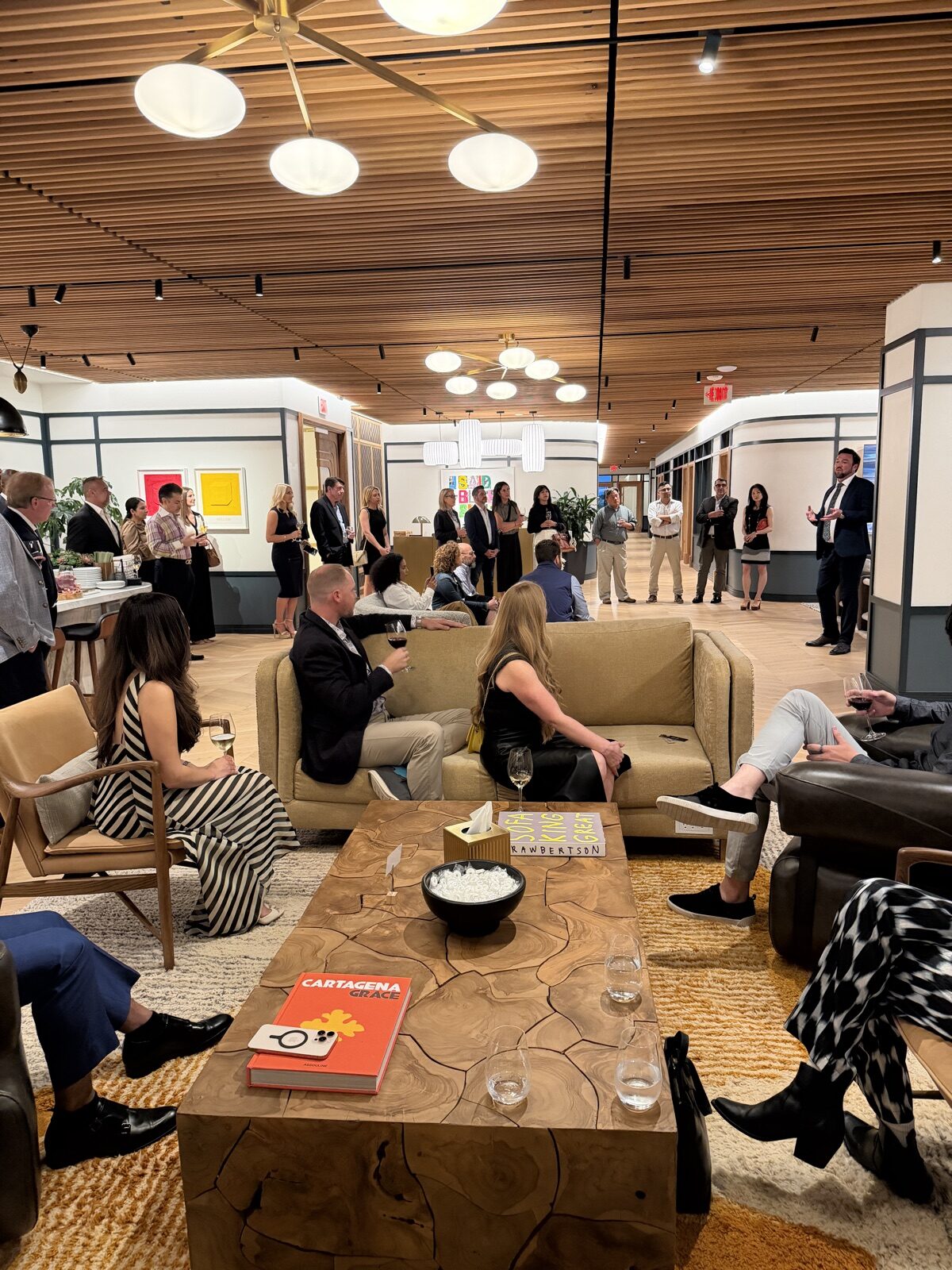 Guests gathered for a discussion at the PushFire office in Houston.